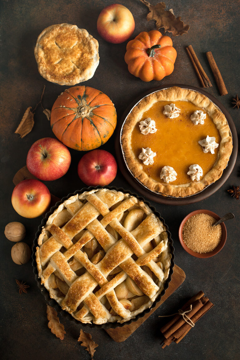 stock-photo-thanksgiving-pumpkin-and-apple-various-pies-top-view-copy-space-fall-traditional-homemade-apple