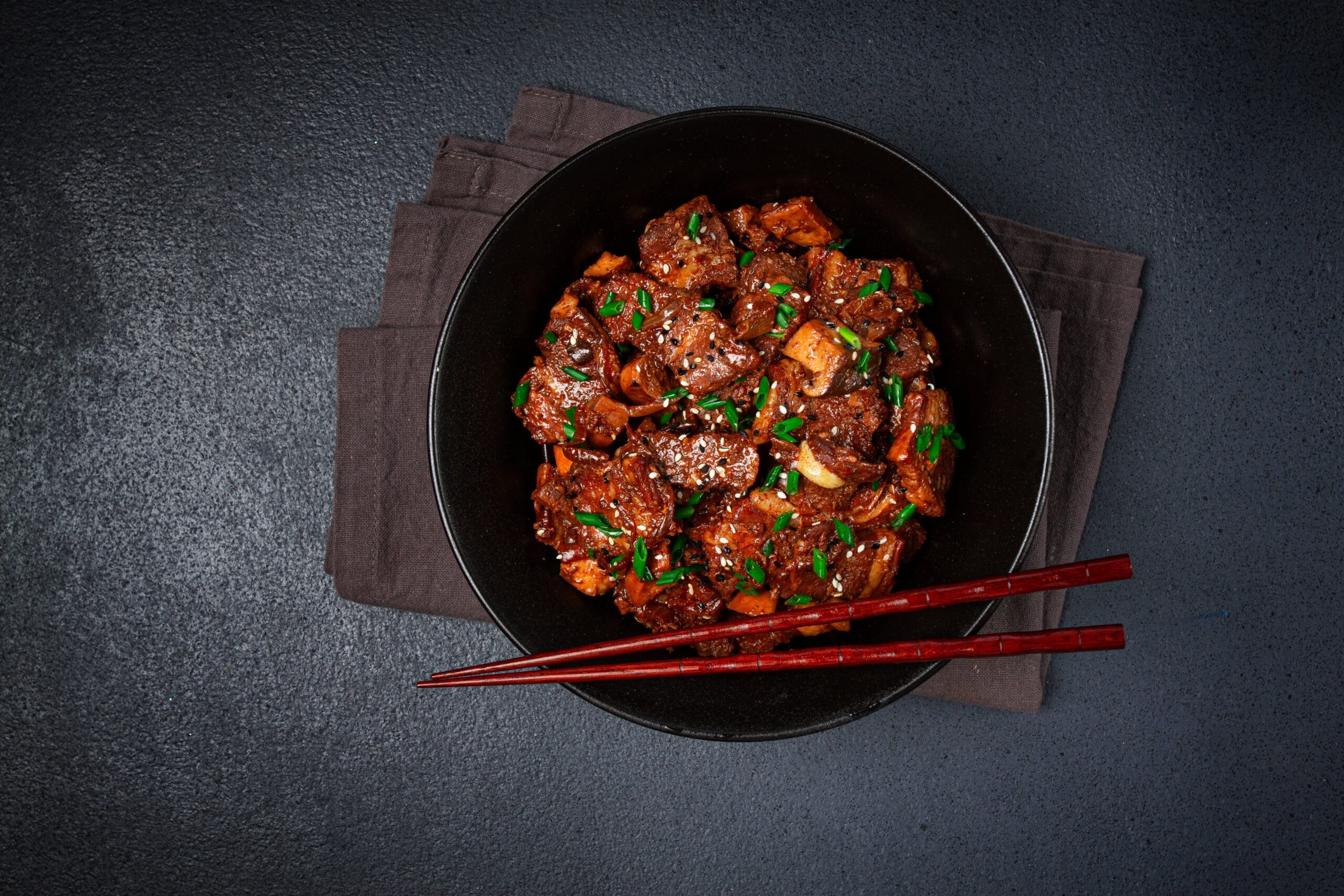 Bulgogi on black surface