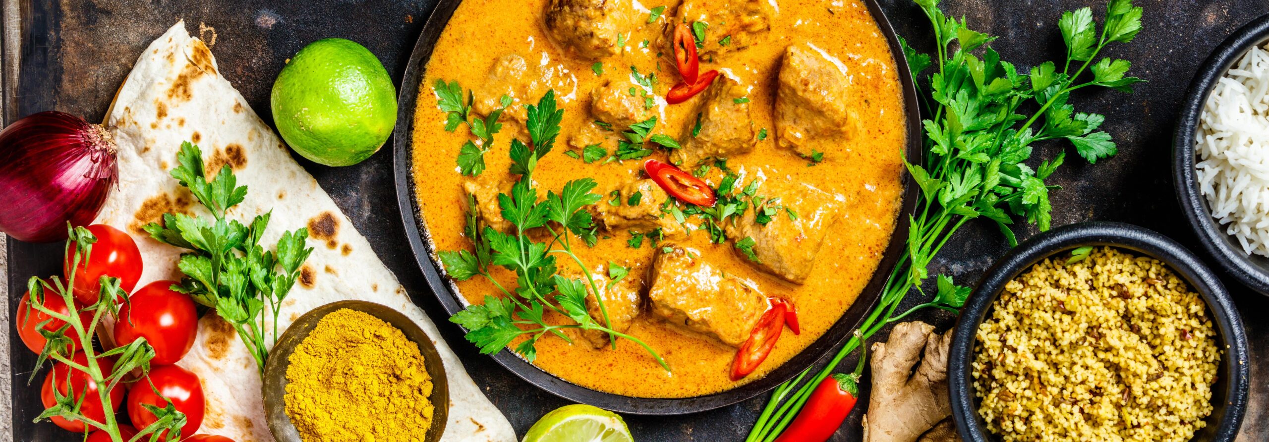Curry dish surrounded by ingredients