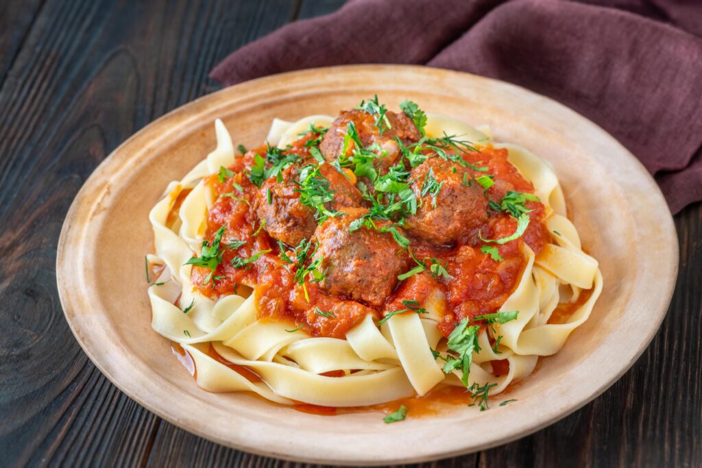 Pasta with marinara sauce and meatballs