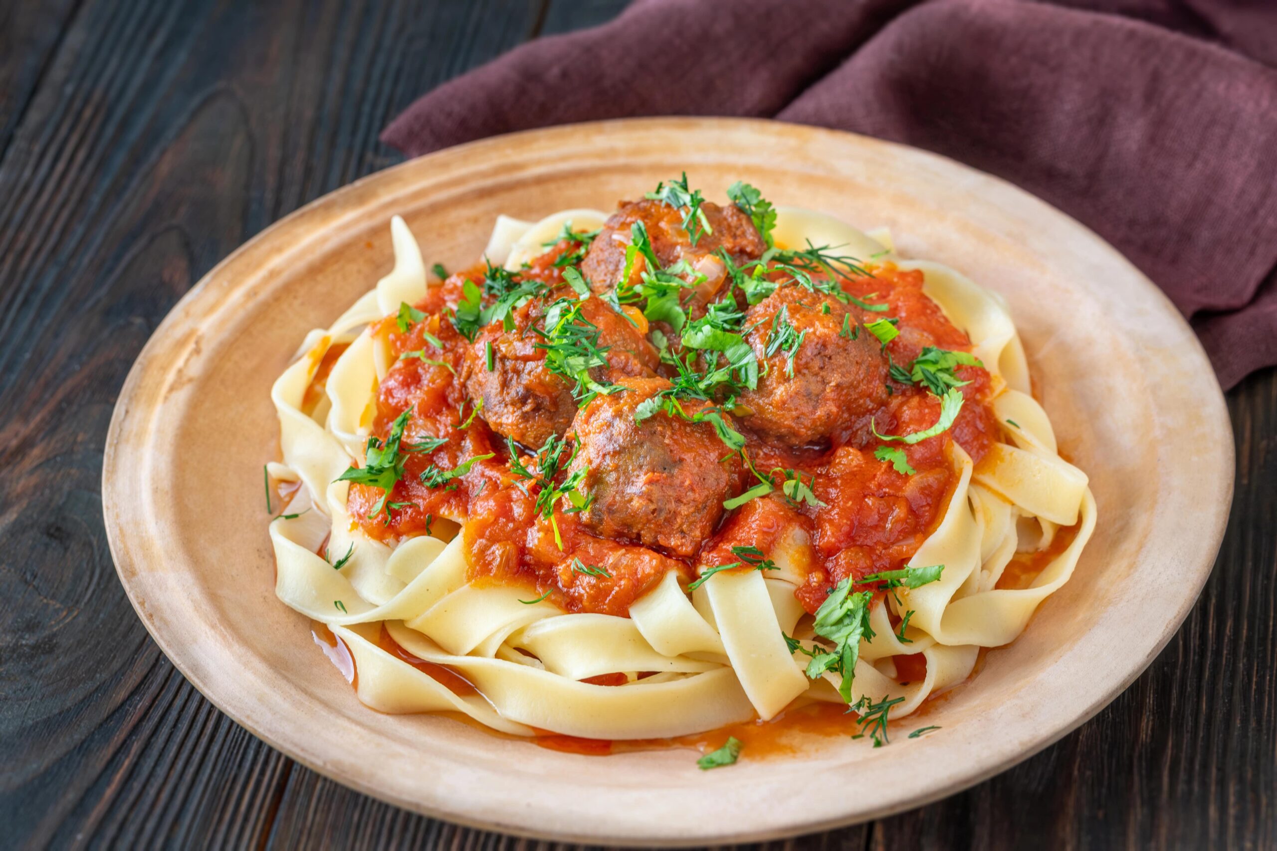 Pasta with marinara sauce and meatballs